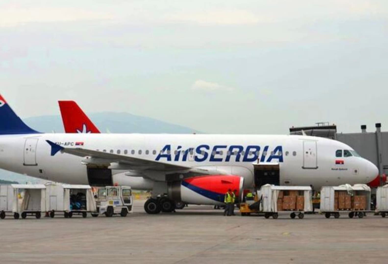 U avionu za Srbiju evakuisani i putnici iz BiH - slika 1